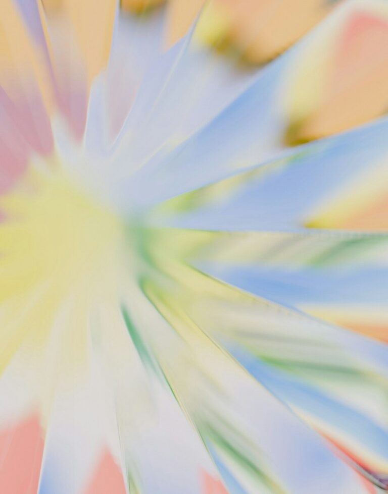 A 3D render of abstract translucent petals radiating from a central point in soft pastel colors